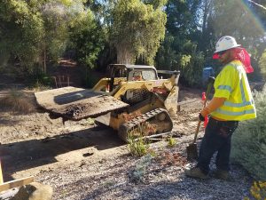 Construction crew installing new ADA accessible pathway