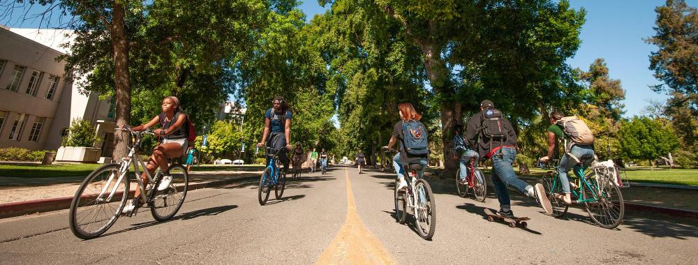 bike riders on campus