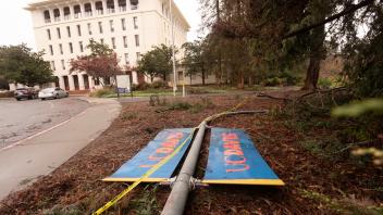 Light pole with UC Davis banners downed near Mrak Hall
