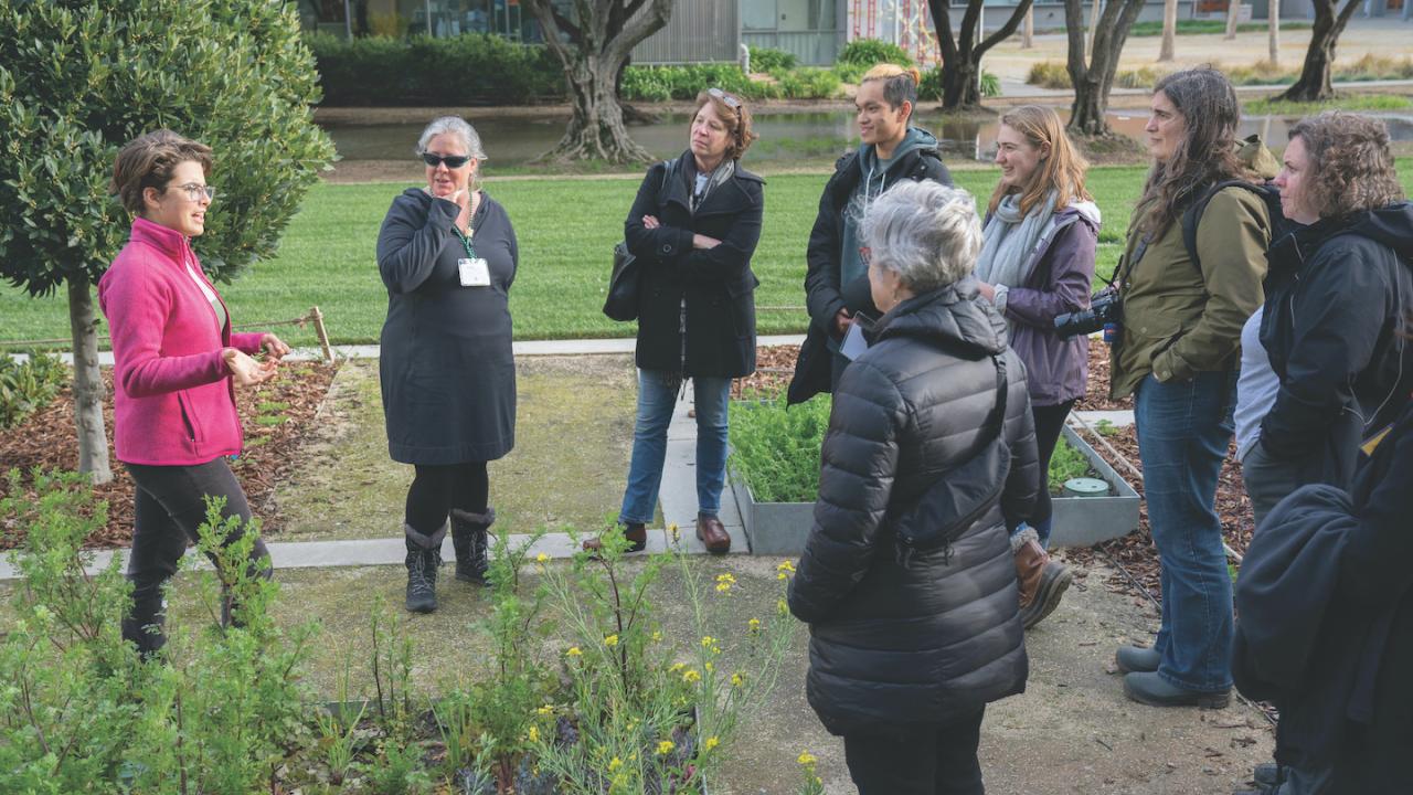 Partners from university-affiliated gardens across North America hear about the Learning by Leading™ program from student Aina Smart Truco (left).