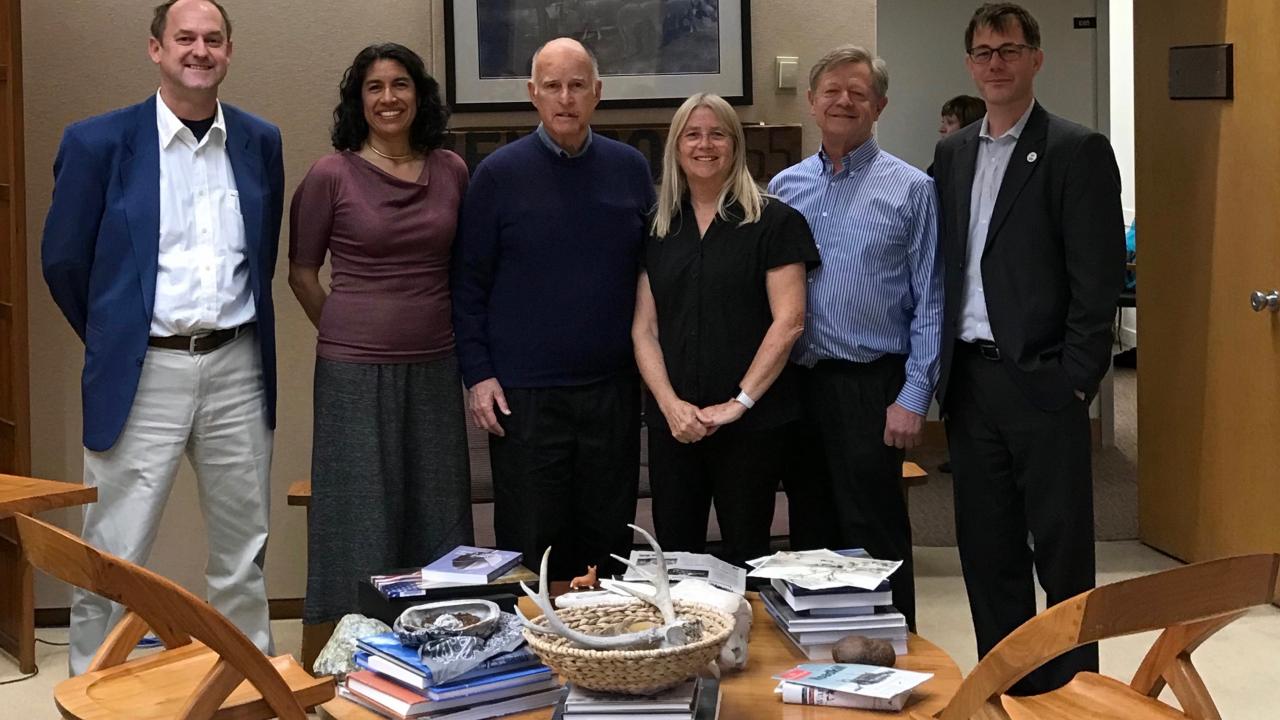 Image of Mary Burke (fourth from left) poses with Dr. David Ackerly (UC Berkeley), Dr. Erika Zavaleta (UC Santa Cruz), Governor Jerry Brown, Todd Keeler-Wolf (CA Department of Fish and Wildlife) and Dan Glusencamp (California Native Plant Society).