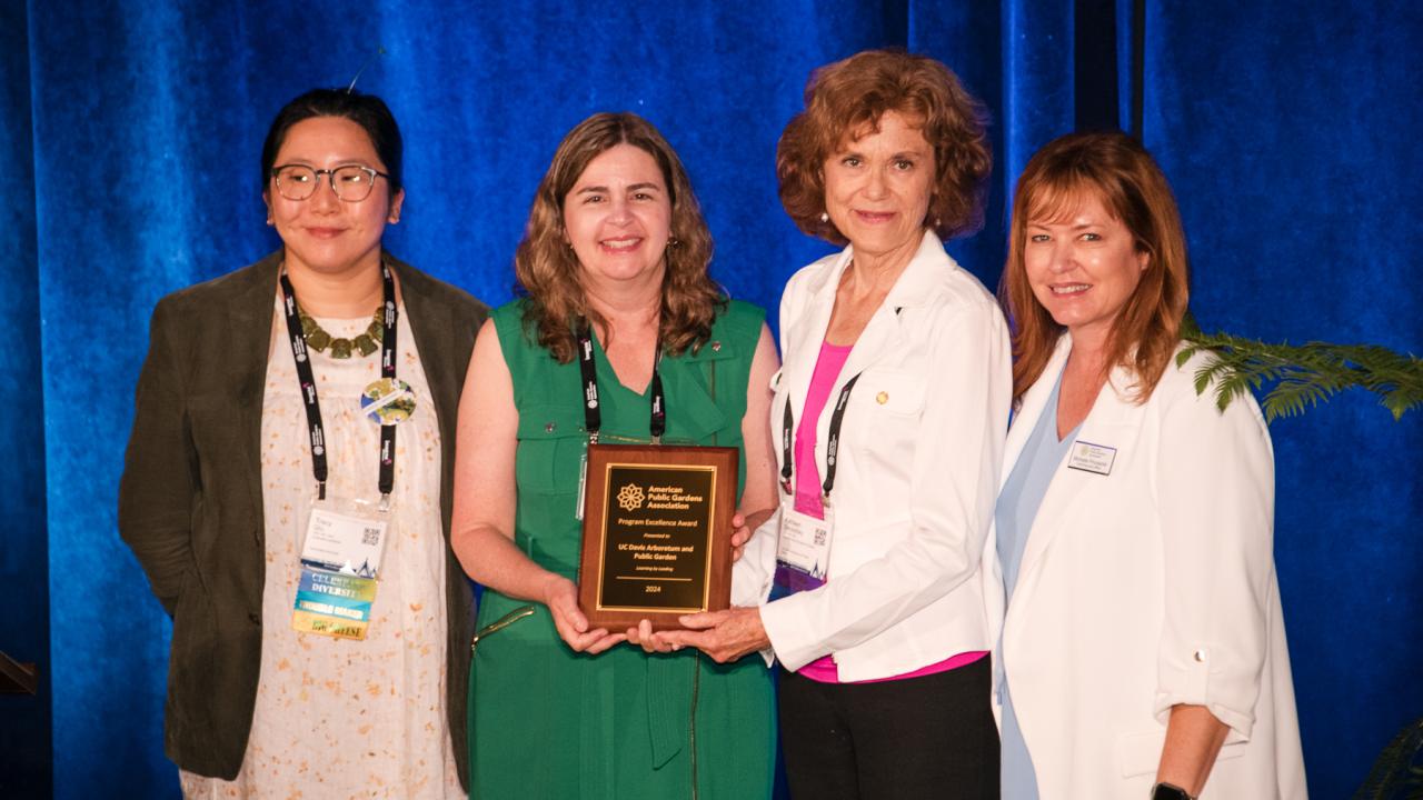 Tracy Qiu, Carmia Feldman, Kathleen Socolofsky, and Michelle Provasnik pose with APGA award plaque
