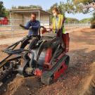 Miles Daprato and Rain Butler installing drip irrigation at Aqua Free garden site 