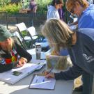 Image of individual signing up for membership with the Friends of the UC Davis Arboretum and Public Garden.