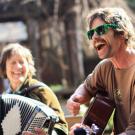 Image of the UC Davis Arboretum and Public Garden's bi-weekly folk music jam session on Wyatt Deck.
