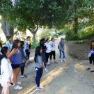 Image of student leading a tour in the UC Davis Arboretum.
